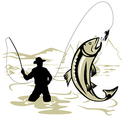 Image showing Fly fisherman catching a trout