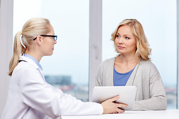 Image showing doctor with tablet pc and ill woman at hospital