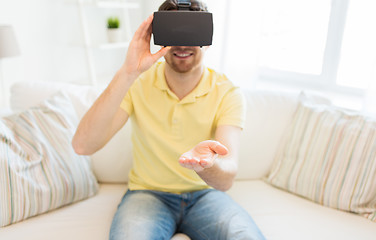 Image showing young man in virtual reality headset or 3d glasses