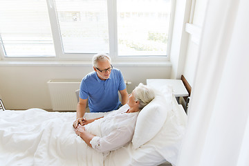 Image showing senior couple meeting at hospital ward