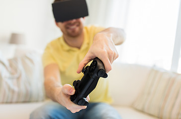 Image showing close up of man in virtual reality headset playing