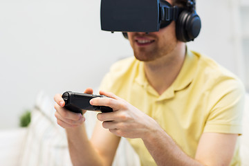 Image showing close up of man in virtual reality headset playing