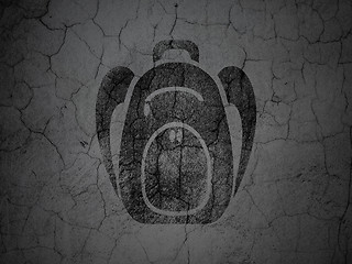Image showing Vacation concept: Backpack on grunge wall background
