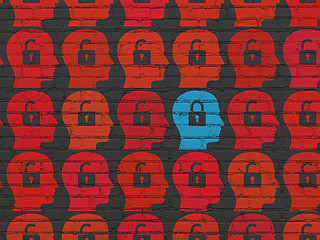 Image showing Protection concept: head with padlock icon on wall background