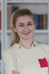 Image showing portrait of female student in library