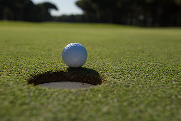 Image showing golf ball in the hole