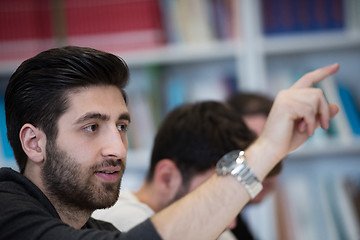 Image showing group of students  raise hands up