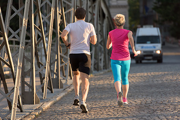 Image showing couple jogging