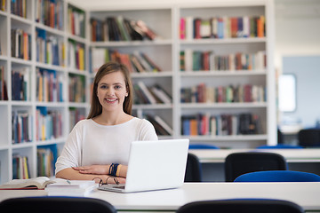 Image showing female student study in school library