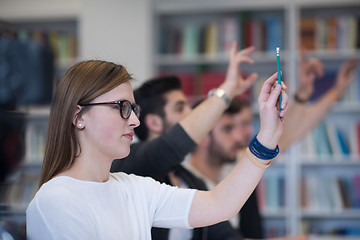 Image showing group of students  raise hands up