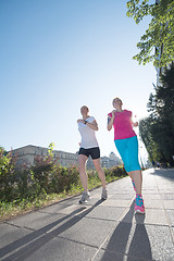 Image showing female friends jogging