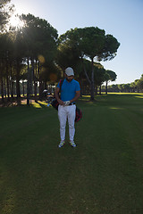 Image showing golf player walking