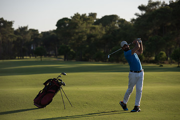 Image showing golfer hitting long shot