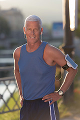 Image showing portrait of handsome senior jogging man