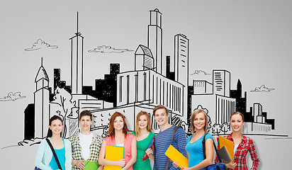 Image showing group of teenage students with folders and bags