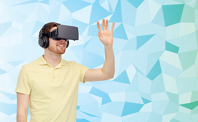 Image showing happy man in virtual reality headset or 3d glasses