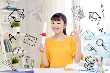 Image showing happy asian woman student with diploma at home