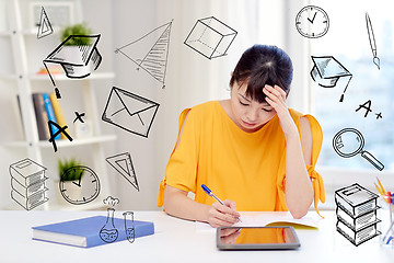 Image showing bored asian woman student with tablet pc at home