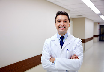 Image showing smiling doctor at hospital corridor