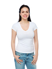 Image showing happy young woman or teenage girl in white t-shirt