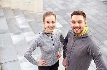 Image showing smiling couple outdoors on city street