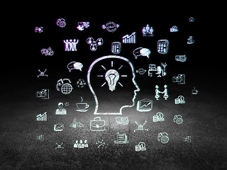 Image showing Business concept: Head With Lightbulb in grunge dark room