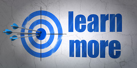 Image showing Learning concept: target and Learn More on wall background