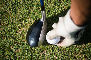 Image showing golf club and ball in grass