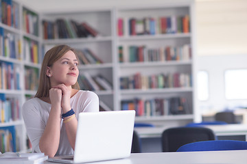 Image showing female student study in school library