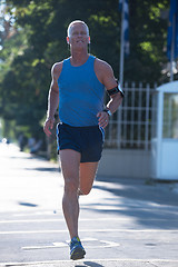 Image showing handsome senior man  jogging