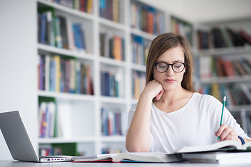 Image showing female student study in school library