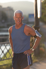 Image showing portrait of handsome senior jogging man