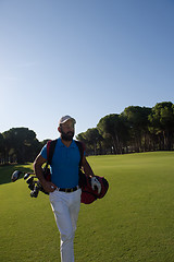 Image showing golf player walking