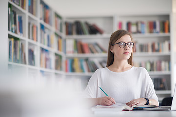 Image showing female student study in school library