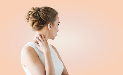 Image showing close up of beautiful woman with ring and earring