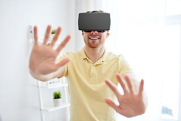 Image showing young man in virtual reality headset or 3d glasses