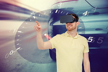 Image showing man in virtual reality headset and car racing game