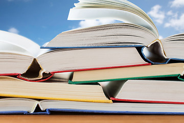 Image showing close up of books on wooden table