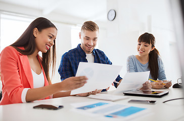 Image showing happy creative team or students working at office