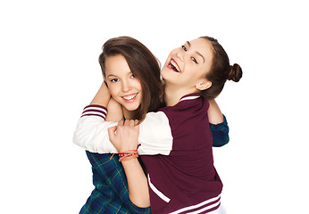 Image showing happy smiling pretty teenage girls hugging