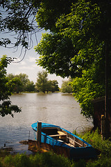 Image showing the boat was moored to the banks of the river