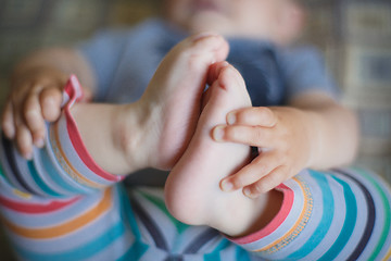 Image showing feet girls in striped pants