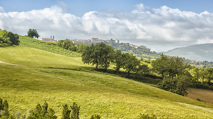 Image showing Camerino in Italy Marche over colourful fields