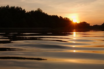 Image showing Sunset over a river