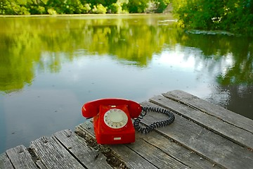 Image showing Old telephone in nature