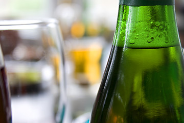 Image showing Close up picture of bottle of beer and glass