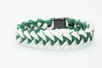 Image showing green braided bracelet on white background