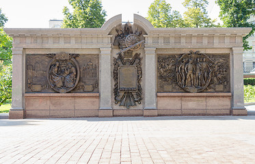 Image showing Moscow, Russia - August 11, 2015: bronze bas-relief depicting the Battle of Borodino and other battles the war of 1812, in front of the monument to Emperor Alexander I in the Alexander Garden Moscow K