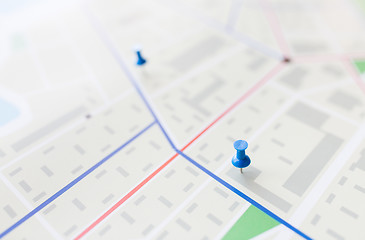 Image showing close up of map or city plan with pin