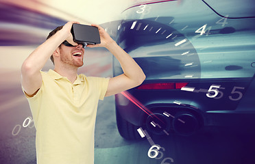 Image showing man in virtual reality headset and car racing game